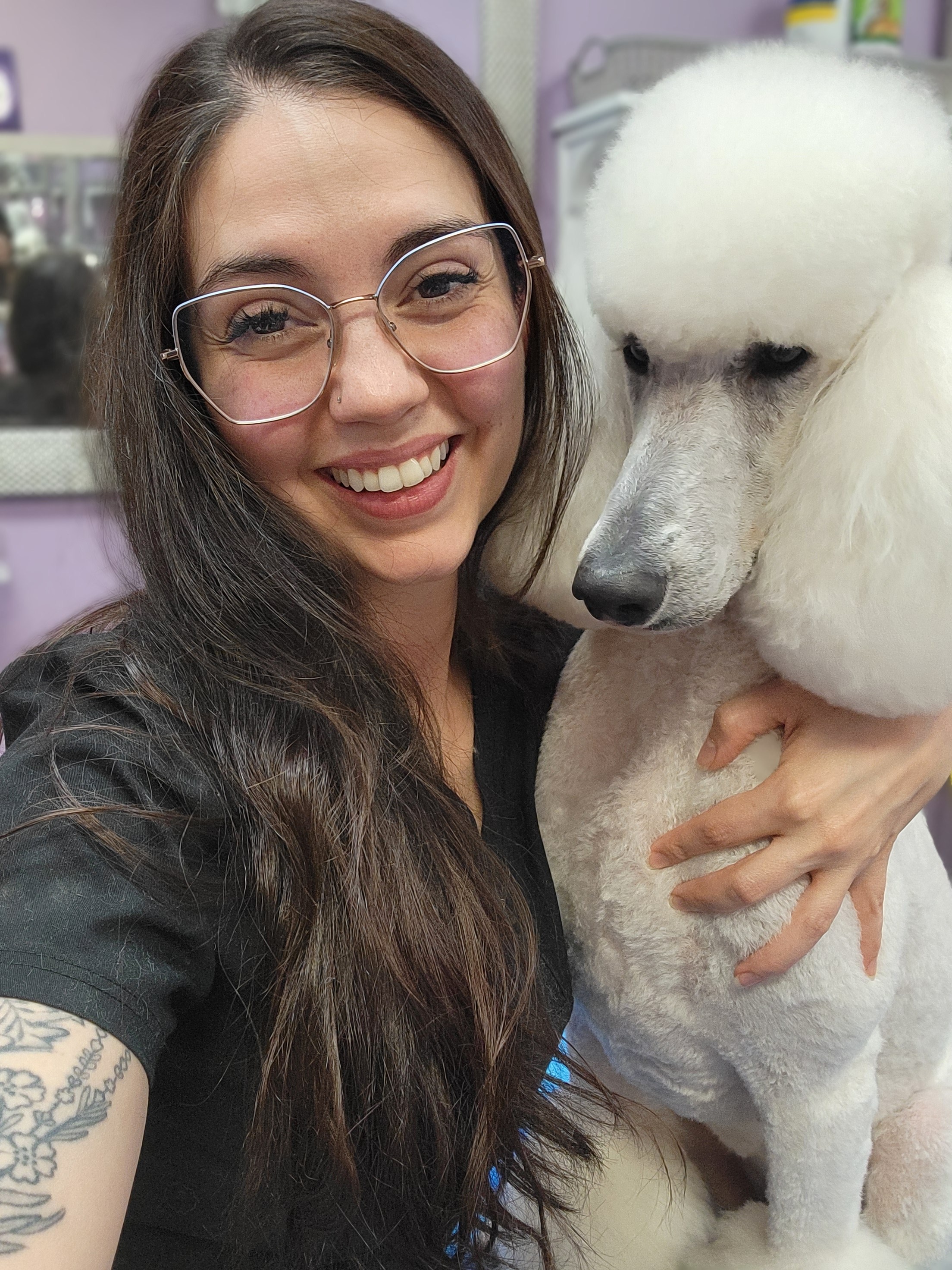 Ashleigh Lopez with her beloved white Standard Poodle Jenna